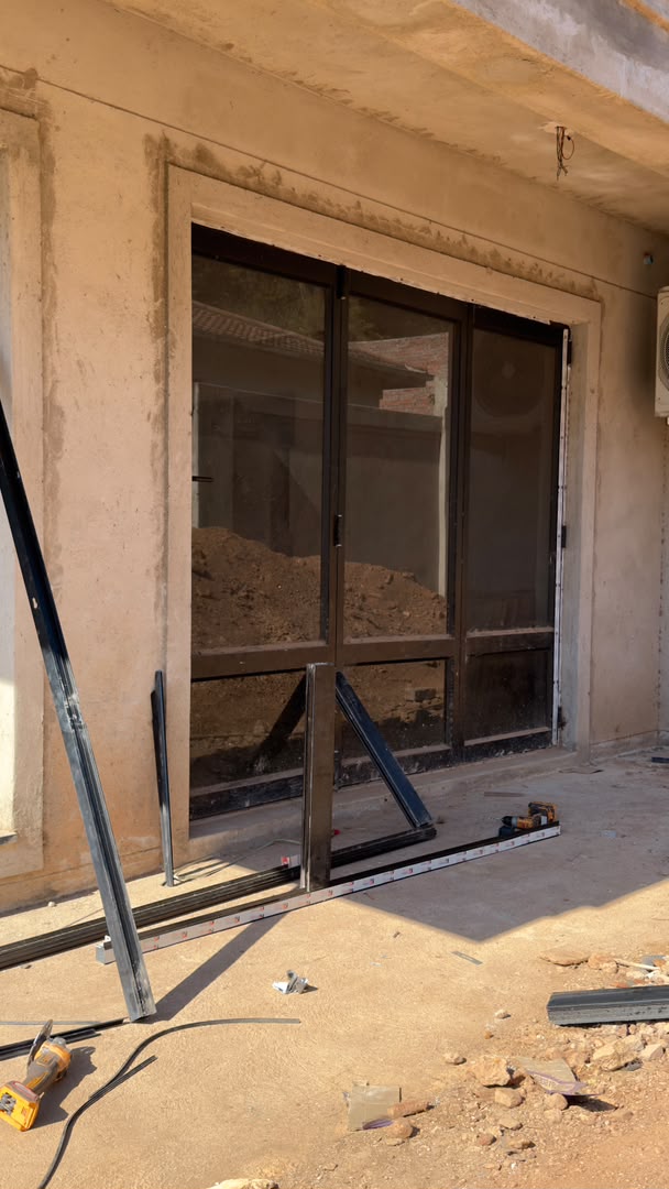 Triple-Track Sliding Door